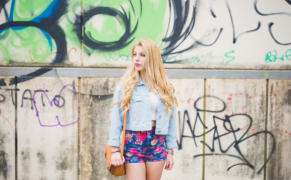 Young beautiful blonde caucasian girl posing