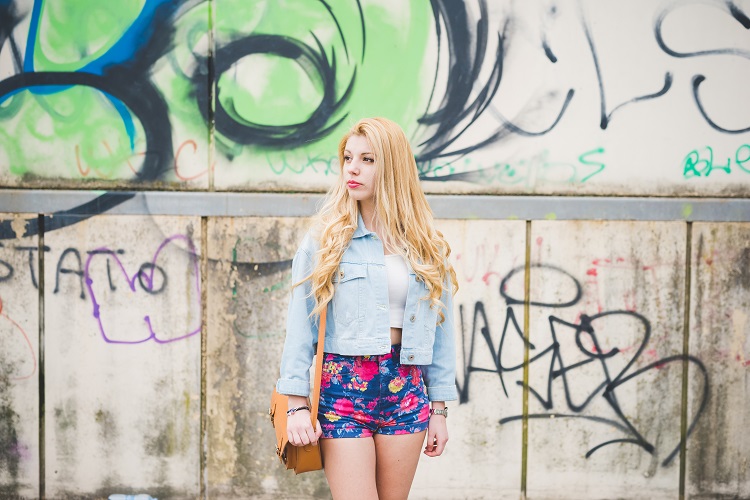 Young beautiful blonde caucasian girl posing